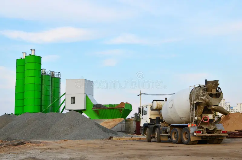 concrete batching plant industrial producing concrete construction heavy mixer concrete trucks waiting to be loaded 160056039